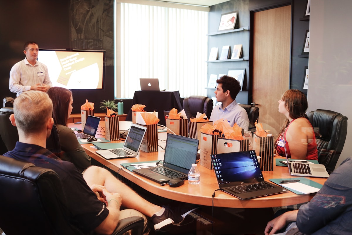 Executive presenting technology strategy to a team